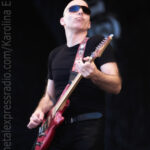 Joe Satriani on stage.