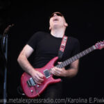 Joe Satriani on stage.