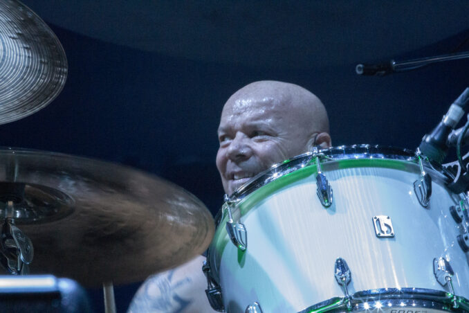 Russell Gilbrook on the drums.